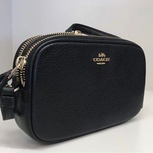 Coach pebbled leather crossbody pouch